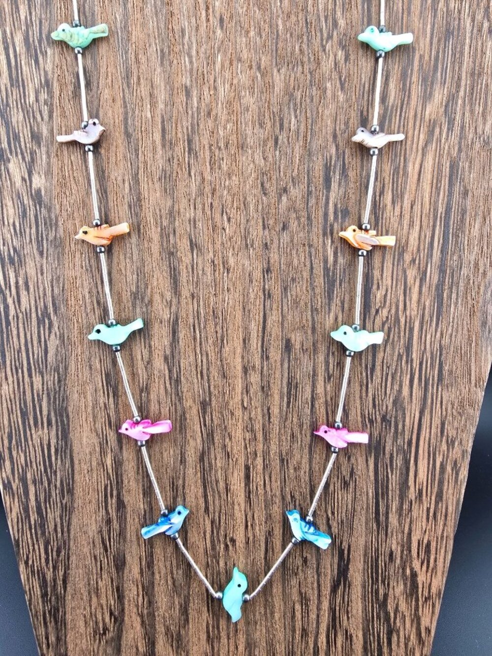 Fetish Bird Necklace Liquid Silver Necklace 13 dyed mother of pearl birds 24"